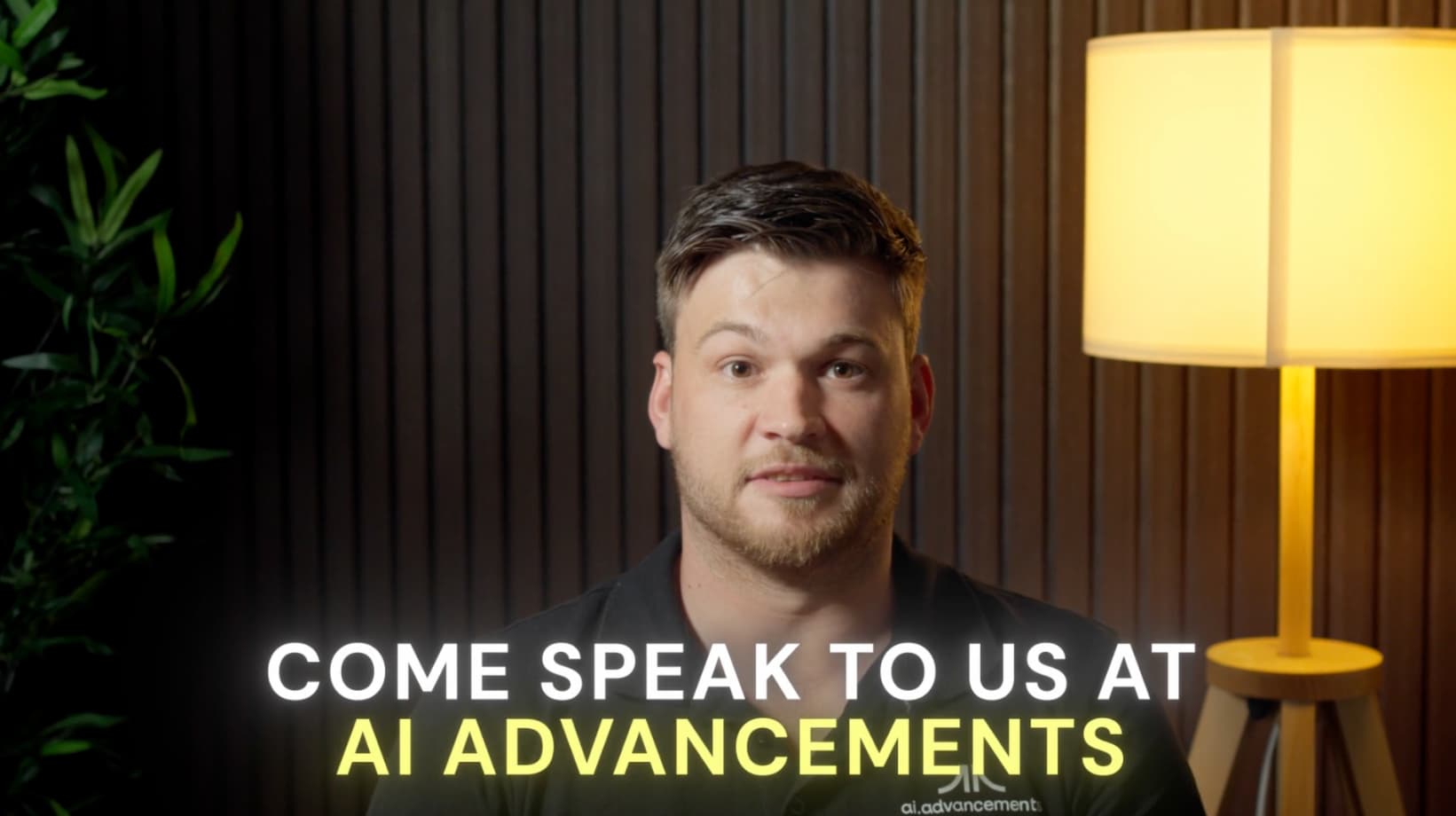 AI Advancements team member inviting viewers to discuss AI chatbot solutions for their business